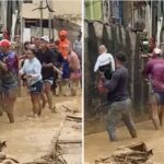 Moradores fazem corrente humana para resgatar bebê de colo; vídeo Moradores fazem corrente humana para resgatar bebê de colo; vídeo