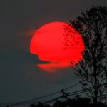 Sol é visto como bola de fogo no calor extremo no céu da capital Acreana